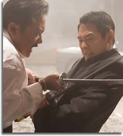 Jet Li, in a katana duel in the film WAR