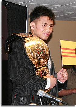 Cung Li and his Strikeforce Middleweight Champion belt