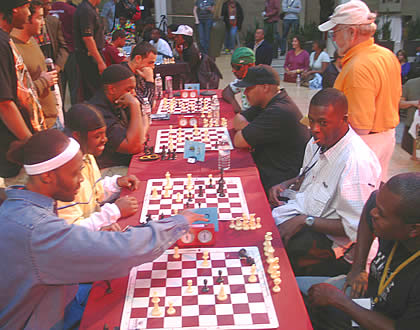 The Celebrity Chess Kings Tournament portion of the event: the eight playas are RZA, GZA, Paris, Amir Sulaiman, Ralek Gracie, Sunspot Jonz, Casual, and Monk